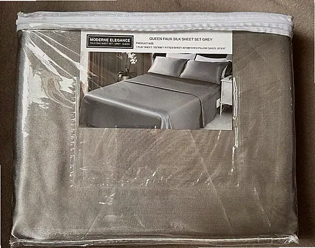 Brand new, never opened/used Grey Queen Faux Silk Sheet Set.
